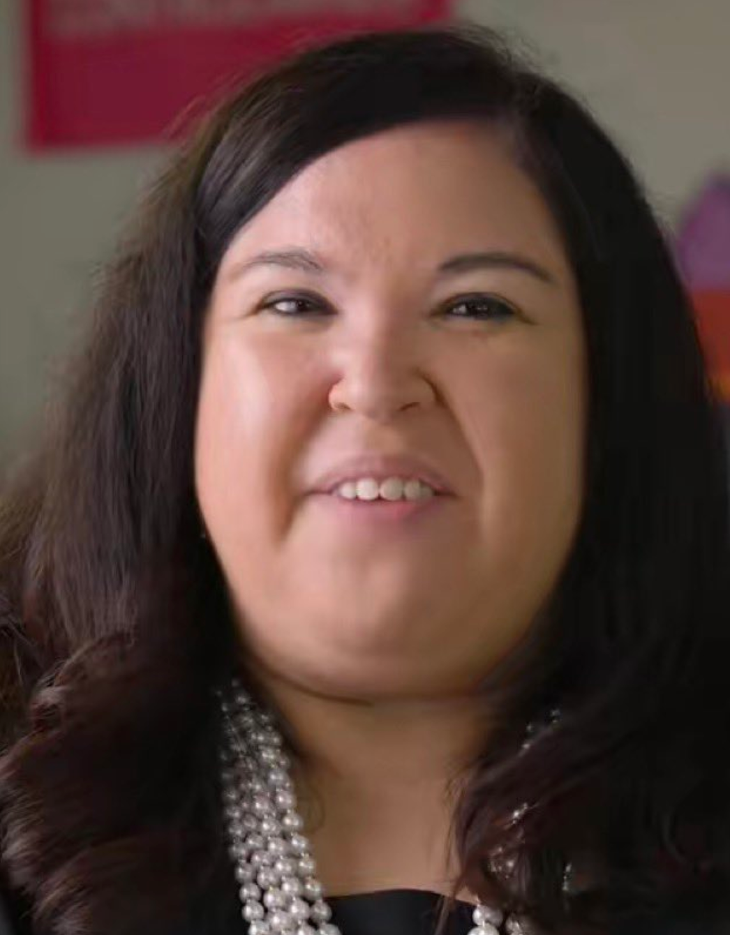 Close-up of Katy Stout speaking to camera